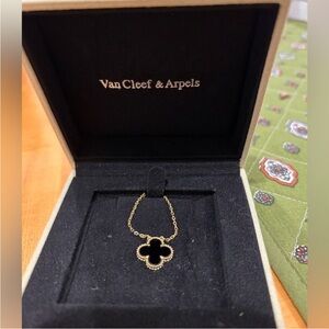Van Cleef & Arpels Gold Necklace with Black Clover Pendant